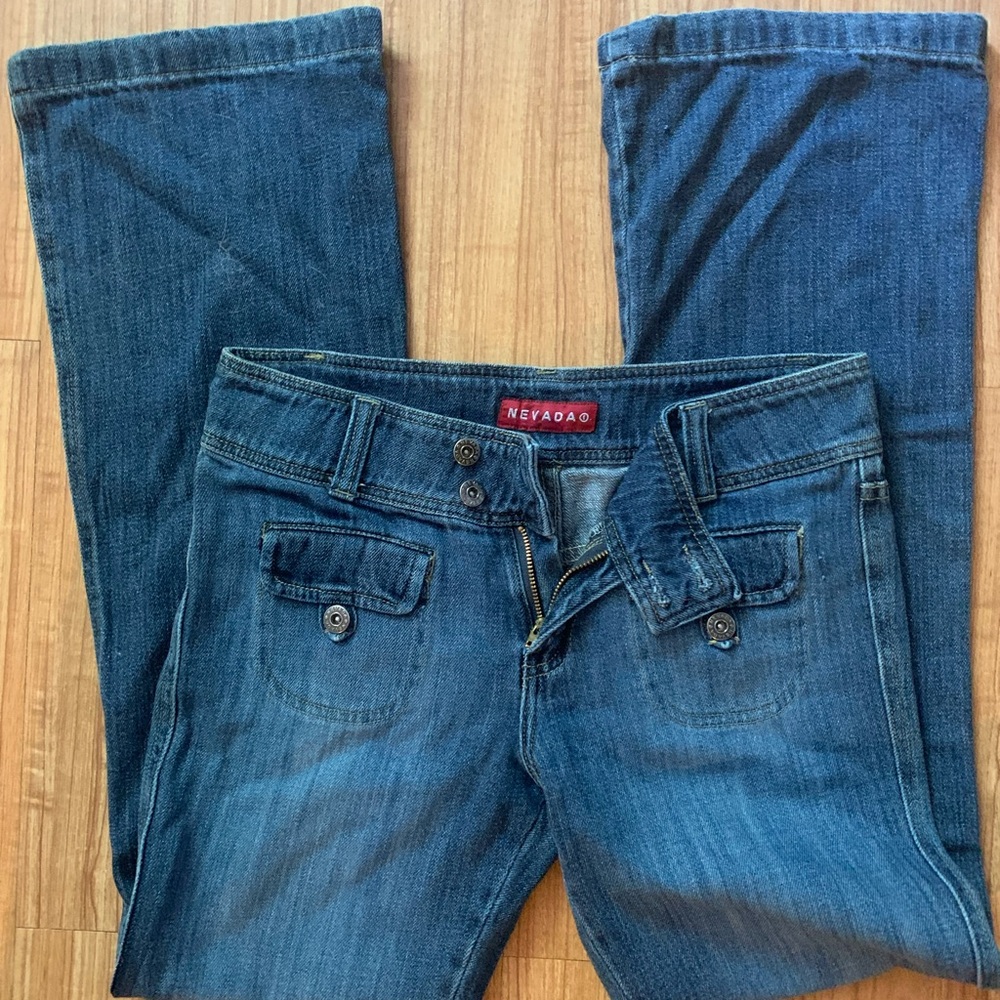 Women's vintage Blue Jeans with two cute front pockets. Very soft.